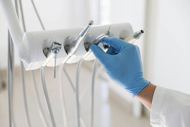 Professional Tooth Extraction technician working in South Jordan, UT
